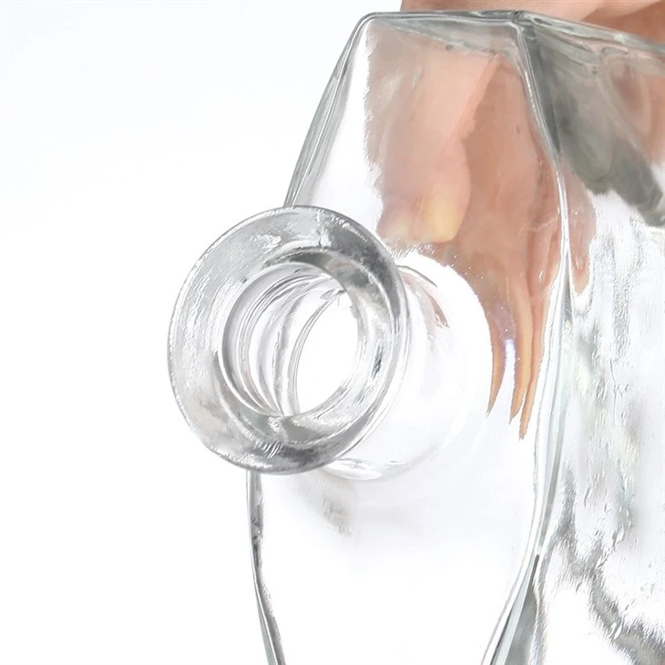 Simple Golden-Lidded Transparent Glass Bottle